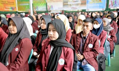Students attending a community development event