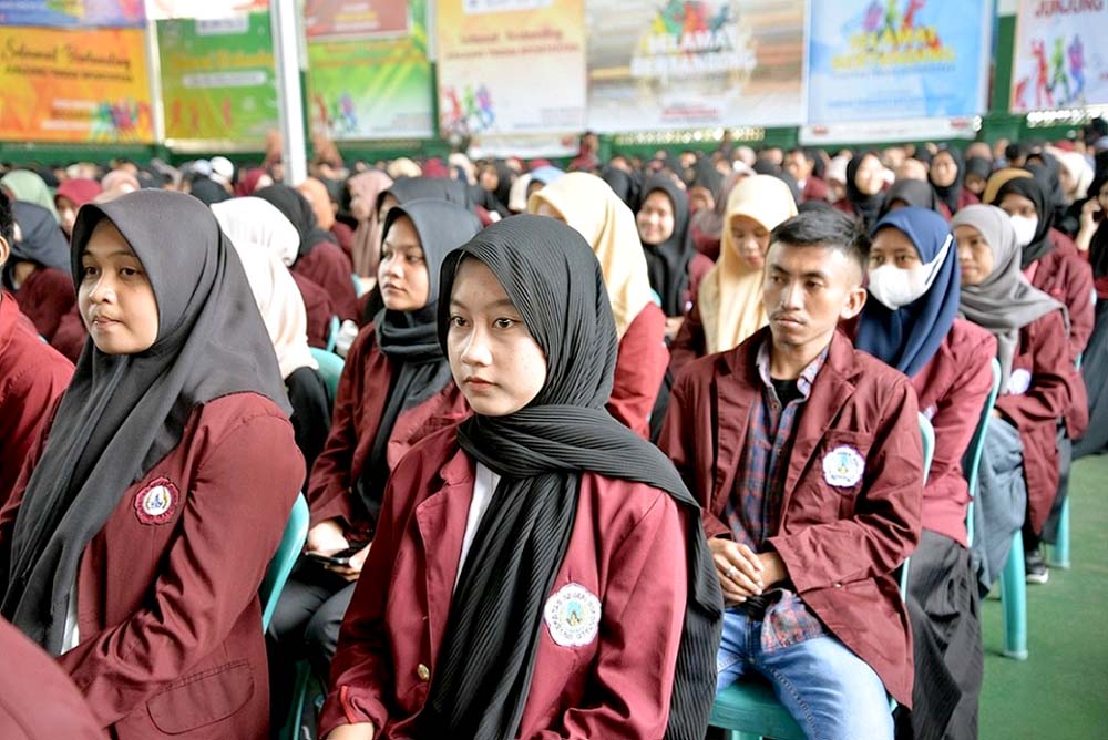 Students attending a community development event